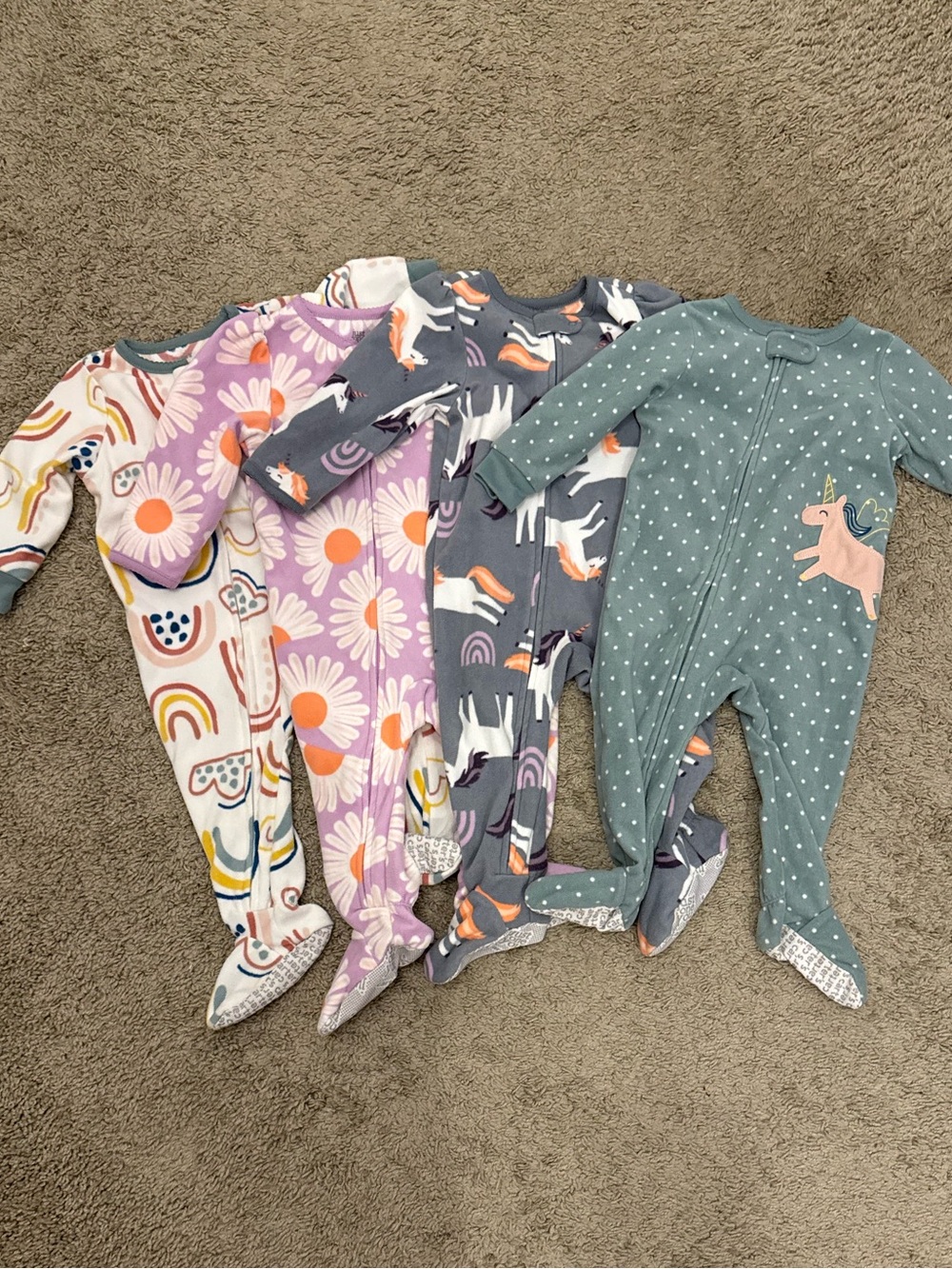 4 Carters footed fleece pajama sleepers 12 months like new!